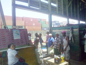  Persons under the fallen roof at the Stabroek Market wharf 