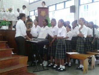The Marian Academy School choir during a performance at the School’s auditorium yesterday to mark World Peace Day.  