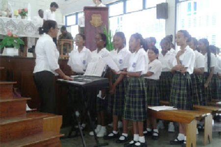 The Marian Academy School choir during a performance at the School’s auditorium yesterday to mark World Peace Day.  