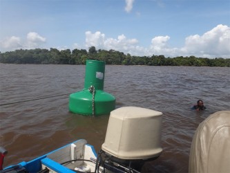 The photos above show two of the three missing buoys