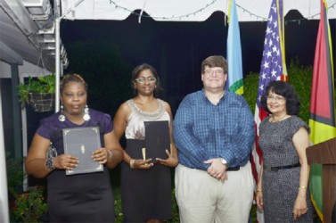 From left are: Wintress White of Red Thread, Omattie Madray of ChildLink, Charge d’ Affairs of the US Embassy Bryan Hunt and Yetrawatee Katryan of Roadside Baptiste Skills Training Centre after the presentation of the grants last evening.          