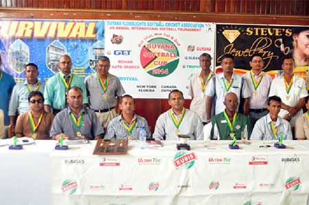 Minister of Culture, Youth and Sports Dr. Frank Anthony (center) is surrounded by executives and members of the GFSCA yesterday at the 4th annual launching of the Guyana Softball Cup.