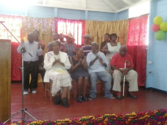 Some residents of the Palms performing “We Give You Thanks” at the Palms Institution yesterday.