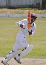 Shiv Chanderpaul reaches his century after hitting pacer Keon Joseph through mid-wicket