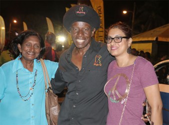 Guyanese international superstar Eddy Grant poses with two fans at GuyExpo, which opened last evening at the Sophia Exhibition Complex (Photo by Arian Browne) 
