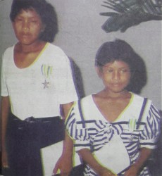 Against all odds: Bertina and Bernadette after they received the Medal of Service at the National Awards ceremony on October 5, 1996. The siblings survived a lengthy ordeal in the jungle.