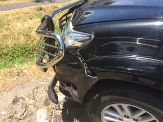 Damage to the side of the vehicle that the minister was said to be driving at the time of the collision. 