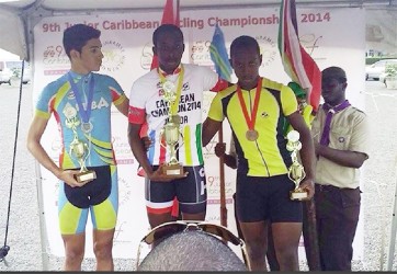 Guyana’s Alonzo Ambrose right on the podium at last weekend’s Junior Caribbean Cycling C/ships