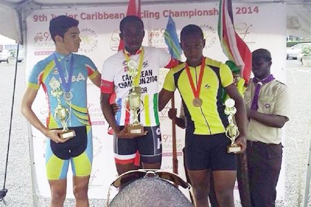Guyana’s Alonzo Ambrose right on the podium at last weekend’s Junior Caribbean Cycling C/ships