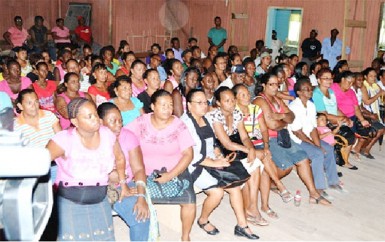 Residents of  Kwakwani and surrounding areas gathered to receive their laptops (GINA photo) 