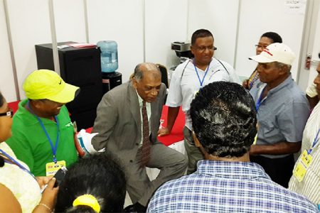Suriname agri talks: Agriculture Minister Dr Leslie Ramsammy (centre) meeting with a group of Guyanese farmers who participated in the three workshops during the Caribbean Week of Agriculture being hosted in Suriname. The majority of the farmers attended the Value Chain Development workshop aimed at growing the family farms.
