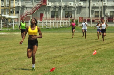 Christ Church’s Avon Samuels leaves her rivals in the rearview on her way to winning the U-18 girls 200m. (Orlando Charles photo) 