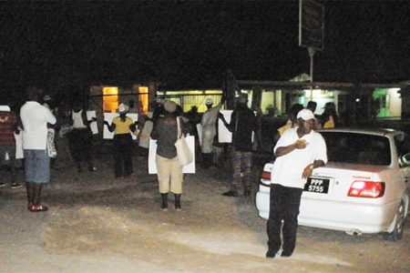 Disgruntled Linden PNCR/APNU supporters locked out of a meeting held by their leader David Granger at the Mackenzie High School on Friday evening.