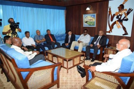 President Donald Ramotar meeting Executive Director of Pinnacle Green Resources Manu Bansal (third from right), IAST Head Dr Suresh Narine (extreme right) and other stakeholders. Also in photograph is Minister of Tourism, Industry and Commerce (ag) Irfaan Ali (second from right). (GINA photo)