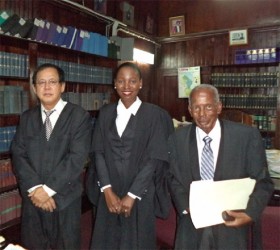 From left: Acting Chief Justice Ian Chang, Folio Richards and Senior Counsel Keith Massiah 