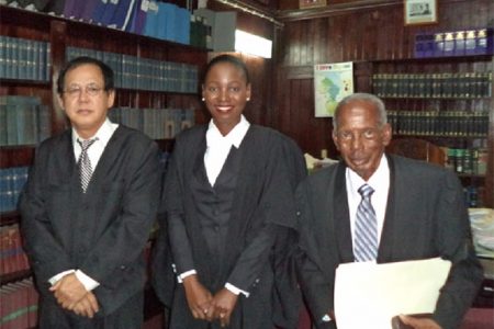 From left: Acting Chief Justice Ian Chang, Folio Richards and Senior Counsel Keith Massiah
