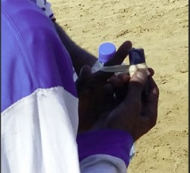Trinidadian jockey, Keran Razack is pictured with the device allegedly used to shock Princess She is Not of the Shariff Racing Stables.
