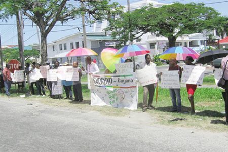 Protesters yesterday in front of the Ministry of Amerindian Affairs.