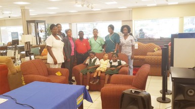 Candace Kewley (far right), the Head Nurse at the Ptolemy Reid Rehabilitation Centre, along with other staff members, patients and Guyana’s Public Relations and Promotions Officer Roberta Ferguson with the new suite donated by Courts. 
