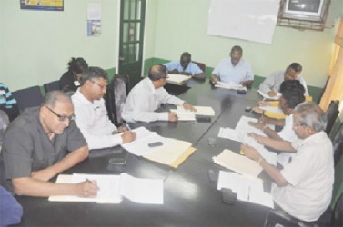 The two sides during the arbitration meeting (Ministry of Labour photo)