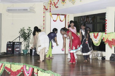 University of Guyana Hindu Society executive members performing a cultural presentation. (Photo by Arian Browne)