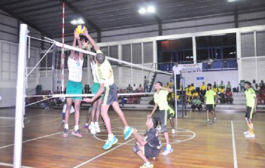  Joshua Jagmohan (11) goes up for a spike during the third set of Guyana’s straight set win versus French Guiana last night at the Ismay van Wilgen Sporthal. (Orlando Charles photo) 