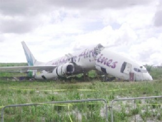 The damaged Caribbean Airlines plane after it ran off the runway in 2011. 