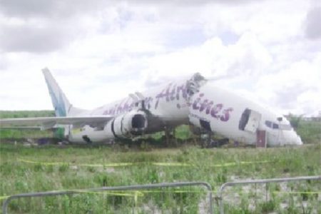 The damaged Caribbean Airlines plane after it ran off the runway in 2011.
