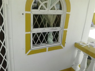 The window the bandits used to gain access to the premise