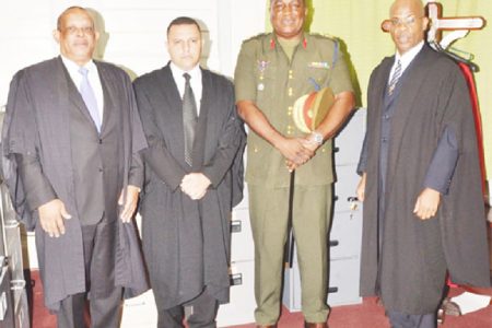 From left, Attorney at Law, Andrew Pollard, Major Michael Shahoud, Brigadier Mark Phillips and Justice Brassington Reynolds