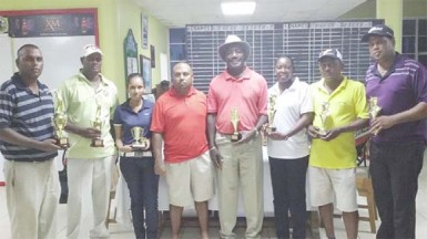 Lusignan Golf Course Open winners display their trophies  
