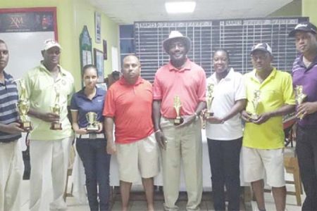 Lusignan Golf Course Open winners display their trophies
