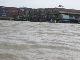  A view of the run down wharf from the Demerara River 