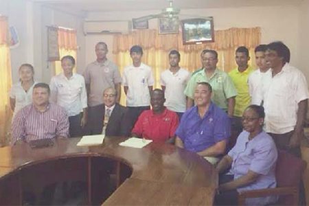 CAC-bound athletes and officials pose for a photo opportunity with president of the GOA, K Juman Yassin (sitting second from left) following yesterday’s press briefing.
