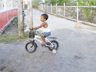 Taking a spin on his bike 