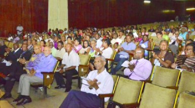 President Donald Ramotar and Opposition Leader, David Granger amid the gathering at the  Caribbean Baptist Fellowship Assembly’s opening at the National Cultural Centre. (GINA photo)
