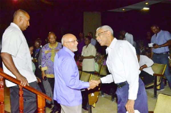 So what about that no confidence motion? President Donald Ramotar (centre) greets  Opposition Leader, David Granger at the Caribbean Baptists’ Convention on Wednesday at the National Cultural Centre. This was a day after the President had announced that if the opposition proceeded with a motion of no-confidence against  his government he would either prorogue or dissolve Parliament. (GINA photo)