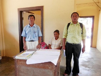 Headmaster of the Apoteri Primary School Alan Edwards (left) with his staff 