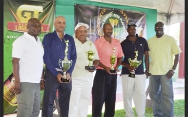 The champion Patanjalee “Pur” Persaud (second left) with other winners Vijay Deo, Sunil Lauton and Jaipaul Suknanan flanked by Banks DIH Communications Manager Troy Peters and Lindel Harlequin (Senior Manager – Credit and Marketing) of Citizens Bank. 