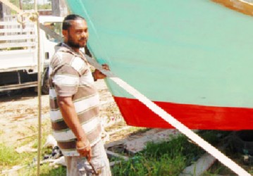 Boat builder, Amjad Khan at work 