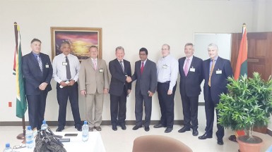From left: AMLGC consultant Rod Stokes; Head of the FIU Paul Geer; EU Ambassador Robert Kopecky; UK High Commissioner Andrew Ayre; Attorney-General Anil Nandlall; Management Officer for the US Embassy Peter Anthes; AMLGC Financial Investigation Adviser for the CCARP Eamon Kearney and AMLGC consultant Gerry Doyle. 