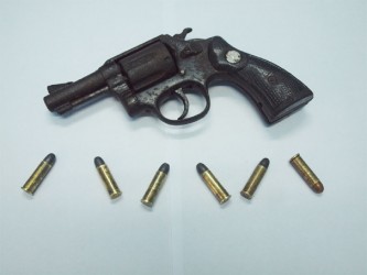 The gun and ammunition which the police found