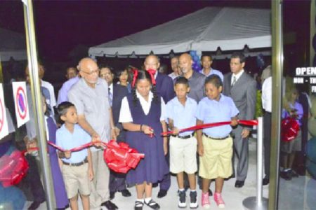 President Donald Ramotar (second from left) looks on as the ribbon was cut last evening for the Guyana Bank for Trade and Industry branch at Bartica. (Office of the President photo)