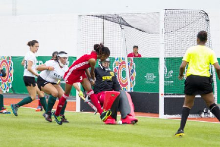 Guyana’s Ulrica Sutherland (right) in the process of challenging Brianna Govia (no.17) of Trinidad and Tobago for possession of the ball during their matchup 