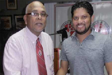 Batsman Ramnaresh Sarwan, right is welcomed by president of the T&T Cricket Board (TTCB) Azim Bassarath ahead of the start of the WICB Professional Cricket League four-day tournament.