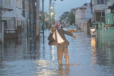 Wading through the streets of Albouystown.    