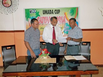 The Umada Cup is an English-speaking Caribbean chess tournament which is hosted annually by FIDE, the World Chess Federation. This year, Guyana is hosting the 2014 version of the competition under the auspices of the Guyana Chess Federation. The tournament has a prize fund of US$16, 000. The nine round swiss system competition begins on Thursday, November 27, and ends on December 1. On Wednesday, Minister of Culture, Youth and Sport  Dr Frank Anthony launched the exclusive tournament at the Sleep Inn hotel, Brickdam, on behalf of the Government of Guyana.  Explaining to the Minister the statistical arrangements for the tournament is President of the Guyana Chess Federation Irshad Mohammed (right). Executive member of the GCF Wayne Brown is on the Minister’s left. Guyana is expected to host about nine chess Caribbean nations for the event.