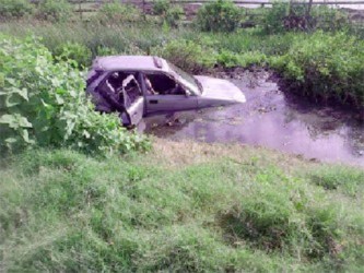 The car in the trench after the accident. (SN file photo)