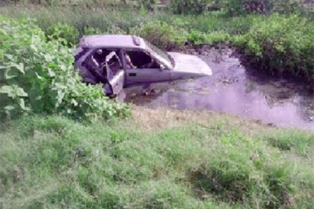 The car in the trench after the accident. (SN file photo)