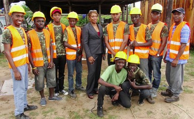 Public Service Minister, Jennifer Westford (centre) with the LINCEP participants. The practical tutor, Ivelaw Handy is at extreme left. 